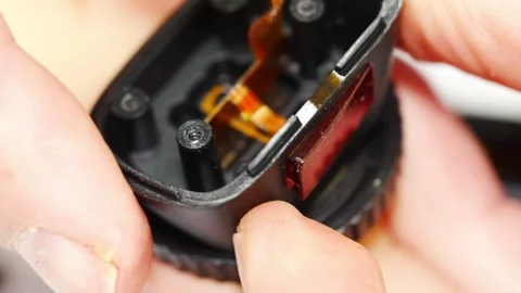 Repair of electronic device in workshop setting Stock Footage 333247053