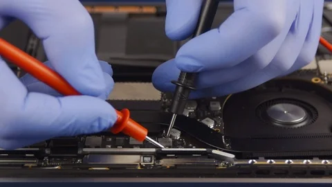 Repair a laptop Stock Footage 104894384