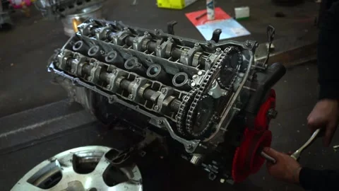 Repair manual engine cranking Stock Footage 325848123