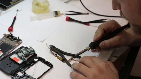 Repair master soldering details of mobile phone. Stock Footage
