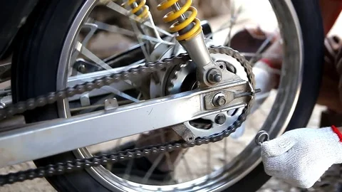Repair motorbike engine Stock Footage 76480383