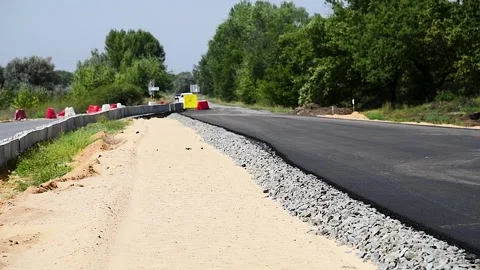 Repair of the old and construction of a new asphalt road Stock Footage 216911472
