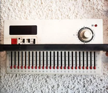 Repair or replacement of the old failed thermostat . Stock Photos