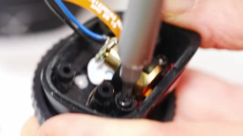 Repair process of electronic devices in a workshop setting Stock Footage 333247092
