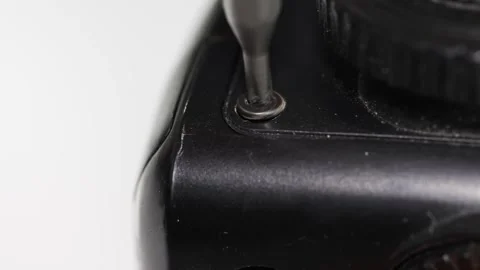 Repair process for electronics with a screwdriver in a workshop Stock Footage 333247313