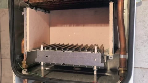 Repair process of a heating unit in a workshop setting Video stock 346165208