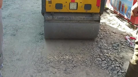 Repair of the sidewalk with a small seal. Stock Footage 252128355