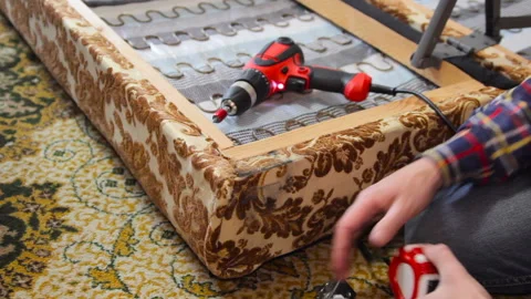 Repair sofa Stock Footage 106934815