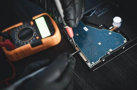 Repair Technician Testing Broken Hdd Hard Disk In Computer Service Center W.. Stock Photos