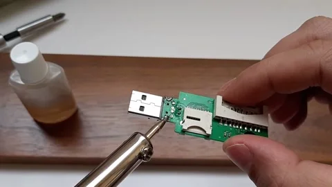 Repair of the USB element Stock Footage 154839923