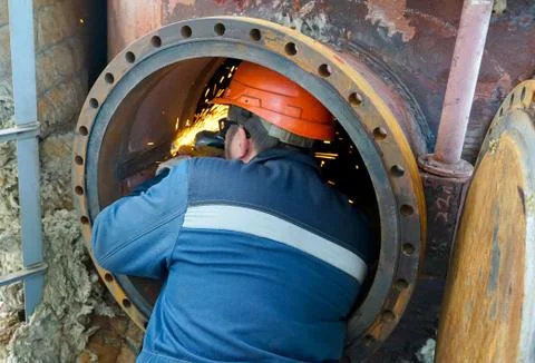 Repair of the weld of the manhole of the process column after heat treatment  Stock Photos