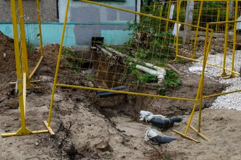 Repair work on changing pipes of centralized water supply. Stock Photos