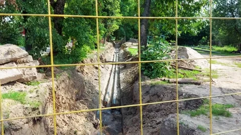 Repair work to replace and reconstruct the old underground pipeline with a new Stock Footage 297850715