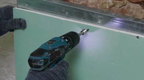 Repairer Make Install Drywall using Screwdriver and Screw 스톡 동영상 43618377