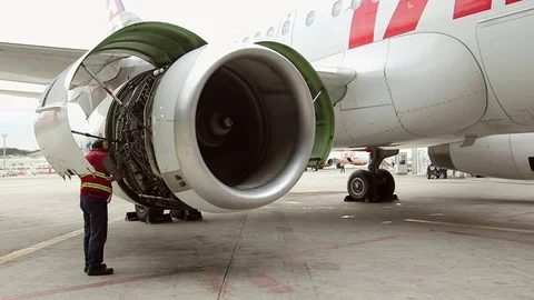 Repairing airplane engine Stock Footage 77053982