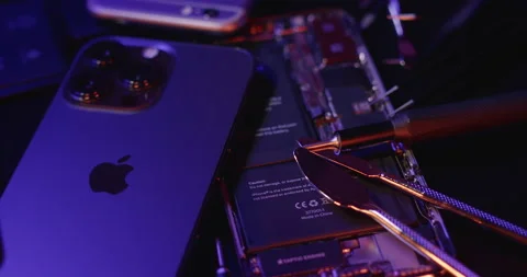 Repairing Apple iPhone, replacing Smartphone battery and damaged display Stock Footage 237414008