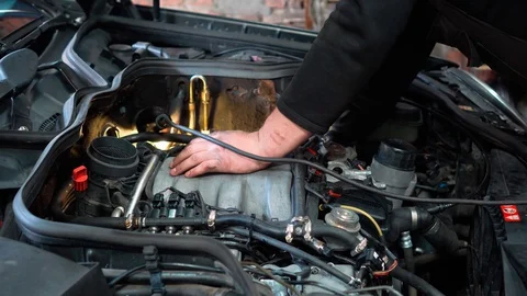 Repairing the car engine. Stock Footage 129831148