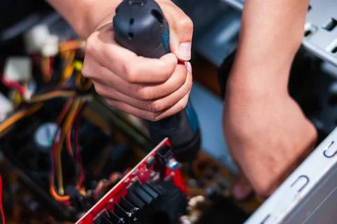 Repairing a computer tech workshop action indoor environment close-up view .. Stockfoto's