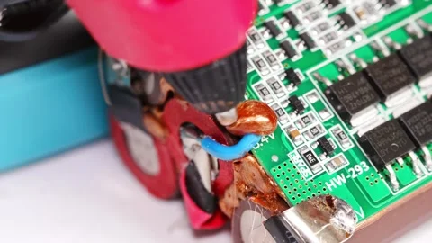 Repairing electronics with precision tools and techniques Stock Footage 333246933