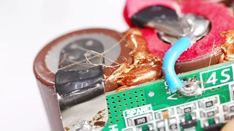 Repairing electronics step by step in a workshop setting Video stock 333246878