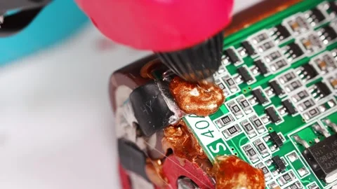 Repairing electronics step by step in a workshop setting Video stock 333246960