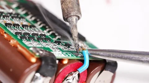 Repairing electronics at a workshop in the city Stock Footage 333246826