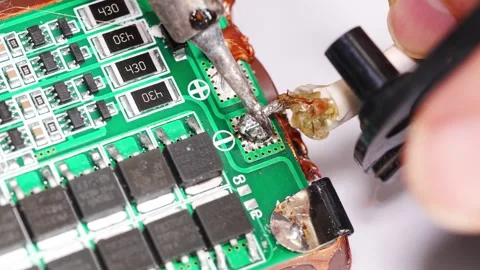 Repairing electronics in a workshop Stock Footage 333246923