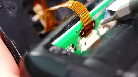 Repairing electronics in workshop with tools and parts Stock Footage 333247751