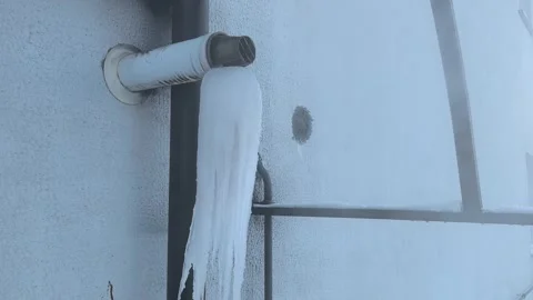 Repairing heating systems after pipe freezing in cold weather at residential bui Stock Footage 327077219