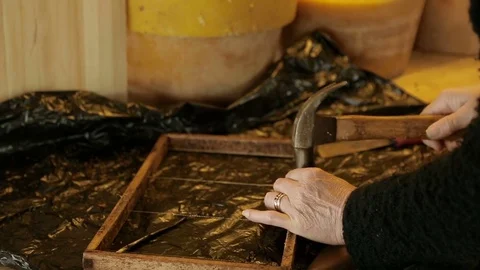 Repairing a honeycomb frame  Stock Footage 74056586