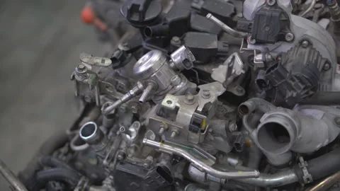Repairing an internal combustion engine in a car service center Stock Footage 263922149