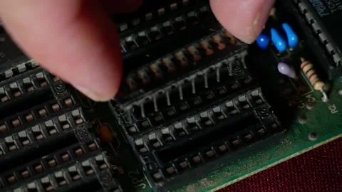 Repairing old computer equipment, replacing a memory module close-up Stock Footage 284479702
