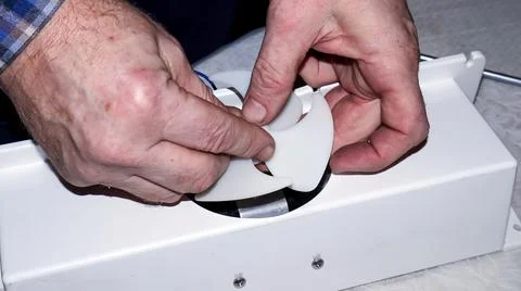 Repairing a refrigerator fan component while ensuring proper airflow and fu.. Stock-Fotos