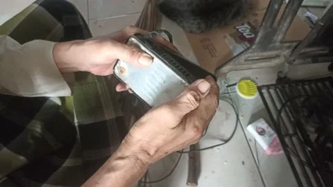 Repairing a sewing machine dynamo Stock Footage 231507545