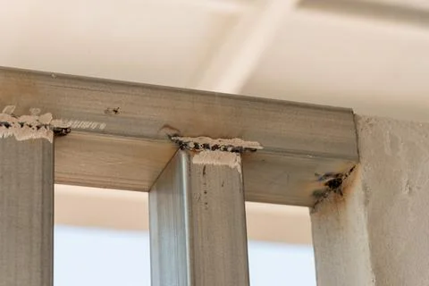Repairing structural integrity of metal frame industrial setting close-up b.. Stock Photos
