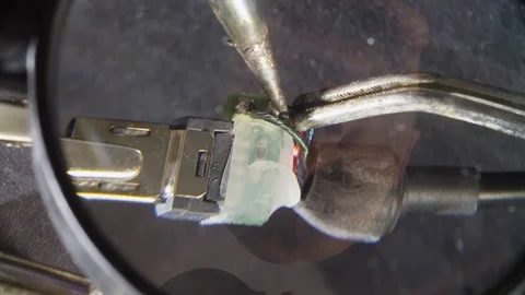 Repairing of a wire for electronic devices Stock Footage 95390034
