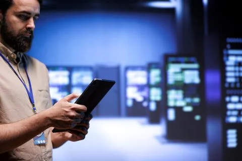 Repairman between mainframes Stock Photos