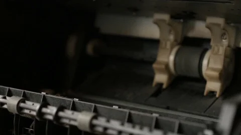 Repairman changes modern laser printer cassette Stock Footage 76681069