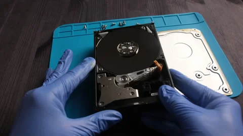 Repairman fixing computer hard disk drive Stock Footage 280111269
