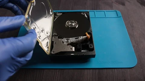 Repairman fixing computer hard disk drive Stock Footage 309327351