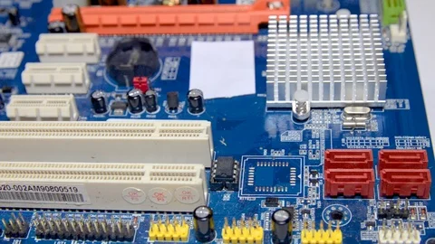 Repairman, master inserts sata cable into computer motherboard Stock Footage 102335252