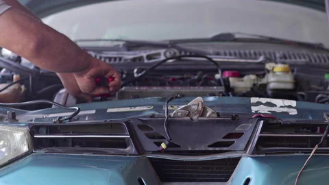 Repairman Repairs Engine of a Broken Car at Auto Repair Shop 5 Stock Footage 161194996
