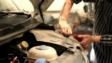 Repairman working on a car. Stock Footage 8961888