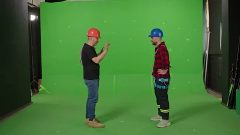 Repairmen discuss the problem and its solution Stock Footage 243438876
