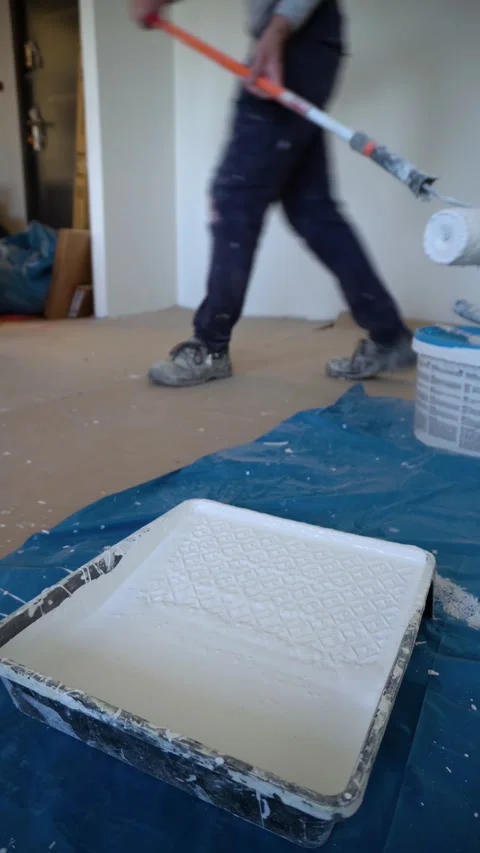 Repairs, construction work, wall painting Stock Footage 313634428