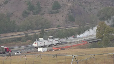 Repairs on an Interstate highway. Exclusive Stock Footage 213974395