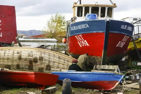 Reparacion de barcos de pesca, Puerto Natales, Regin de Magallanes , Antrtica Stock Photos