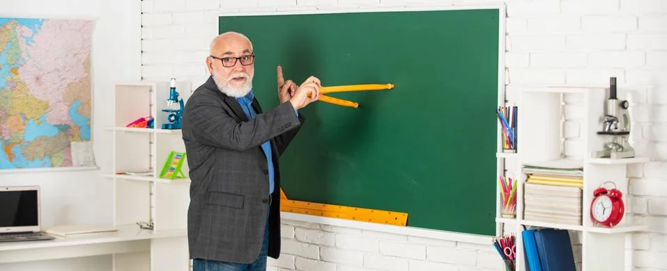 Repeat after me. Towards knowledge. study maths to get good results. senior man Stock Photos