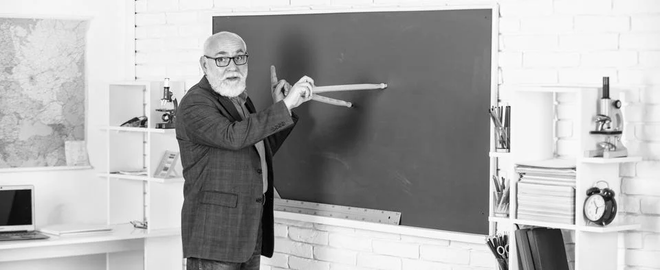 Repeat after me. Towards knowledge. study maths to get good results. senior man Stock Photos