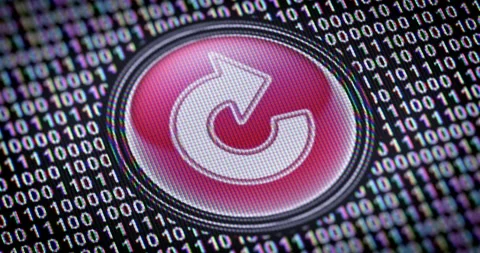 Repeat icon. Binary code ( array of bits ) in the screen. Looping footage Stock Footage 111174517